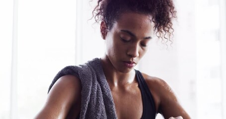 Wall Mural - Woman drinking water, exercise and relax after workout, sport and tired with hydration, health and wellness. Female athlete resting after fitness routine in gym, sweating and drink h2o from bottle