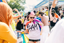 Woman In GAYterosexual T-shirt Having Great Time At Pride