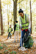 © Oleksii Syrotkin/Stocksy - Global warming Earth day volunteering environment litter team