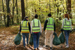 © Oleksii Syrotkin/Stocksy - activists junk pollution collect package outdoors