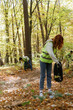 © Oleksii Syrotkin/Stocksy - volunteer rubbish social responsibility good deed