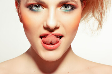 Portrait of beautiful blonde woman on a white background