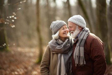 Wall Mural - older couple hugging smiling outdoors, french countryside, joyful and optimistic