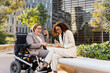 © Nuria Seguí/Stocksy - Businesswomen Eating Lunch Together Outside