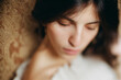 © Amor Burakova/Stocksy - Portrait of a woman with soft focus