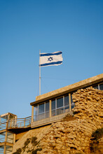 Israel National Flag On A Background Of Blue Sky
