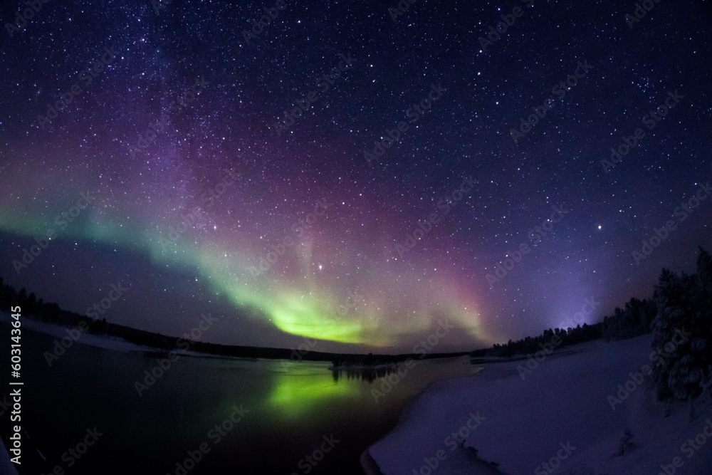 Northern Lights Creates a Display of Light and Color On the Starry Sky ...