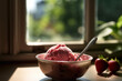 strawberry ice cream with a spoon sticking out of it on a sunny windowsill Generative AI