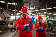 Portrait Happiness Industry Workers With Safety Uniform ,blue Glove And Helmet To Safety Before Start Work To Check Chemical Or Gas In Factory Is Industry Safety Concept.