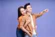 © Timeimage - Photo of young Asian couple on background