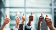 © Jadon Bester/peopleimages.com - Winning, thumbs up and group of people thank you, support or teamwork hands for vote, yes or like emoji. Collaboration, target or winner women and men in business ok, diversity success or thanks sign