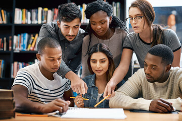 People, students in library and studying for exam or research for project, education and teamwork. Diversity, young men and women in study group and learning with collaboration on university campus