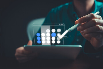 person typing on a touch screen schedule plan calendar. project gantt charts.work, digital computer technology	
