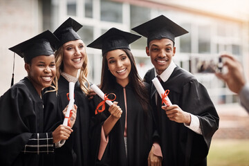 Poster - Students, graduation and diploma of a college group with a smile and pride outdoor. Diversity men and women excited to celebrate university achievement, education success and graduate memory or photo