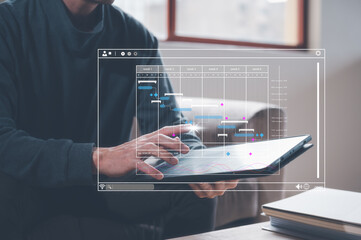 data analysis concept, businessman using computer tablet working on virtual data chart, research and development