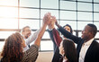 © Stratford/peopleimages.com - High five, business people and group together for teamwork, collaboration or team building in office. Hands of diversity men and women for corporate support, solidarity and mission or motivation