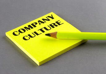 COMPANY CULTURE text written on a sticky on grey background