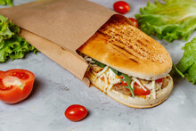Panini Sandwich With Crispy Chicken And Rucola Salad
