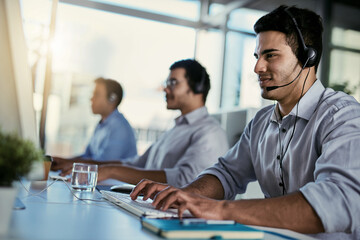 Poster - Crm agent, smile and man in coworking space consulting with advice and happiness at help desk. Happy phone call, conversation and customer support consultant speaking on headset in callcenter office.