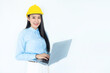 © Darunrat - Asian woman architect or construction engineer wear yellow hardhat on white background.Young asian architect woman smiling happy.Asian woman architect looking and using at laptop. Industry concept.