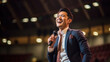 © AS Photo Family - Asian man motivational speaker on stage, talking about success and leadership. Generative AI.