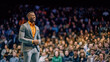© AS Photo Family - African american man motivational speaker on stage, talking about success and leadership. Generative AI.