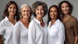 © Dash - group of mature elegant women posing against gray wall and smiling