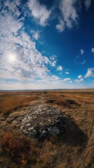 Wall Mural -  a big rock in a big field with a sky background.  generative ai