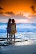© Designpics - two girls in the beach at sunset