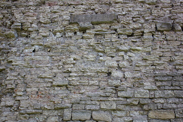 Old brickwork wall. Ancient masonry wall. Antique masonry wall.