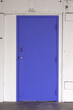 © Jack - New blue steel door on the back of an old warehouse