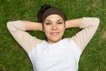 Sticker - attractive woman on green grass