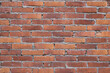 Full frame image of a red brick wall.