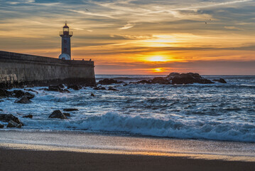 Wall Mural - Sunset over Atlantic Ocean. View from Carneiro beach in Porto, Portugal