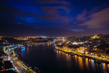 Wall Mural - Evening sky over Douro River and cities of Porto and Vila Nova de Gaia, Portugal