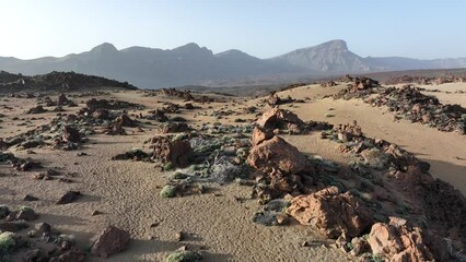 Wall Mural - Aerial video at golden hour of Minas de San Jose park with dry Mars like landscape on Tenerife, Spain