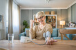 © Miljan Živković - Senior caucasian woman check blood pressure measure device on hand
