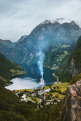Wall Mural - Aerial view Geiranger fjord in Norway mountain landscape ferry cruise ship sailing Travel beautiful destinations norwegian landmarks