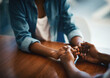 © Stratford/peopleimages.com - Empathy, kindness and support with friends and holding hands for comfort, understanding and gratitude. Hope, help and trust with closeup of people at home for depression, praying and forgiveness
