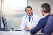© Koegelenberg/peopleimages.com - Medical, discussion and doctor in a consultation with a patient analyzing diagnosis in the clinic. Professional, conversation and mature male healthcare worker talking to man in the medicare hospital
