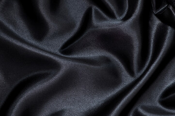 Smooth elegant black silk. background design