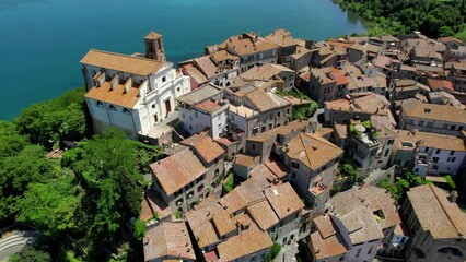 Wall Mural - Scenic lake Lago di Bracciano, aerial view of scenic village Anguillara Sabazia. Popular for short trips from Rome. Lazio region
