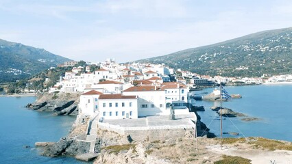 Wall Mural - Greece. Andros Island, Chora town aerial drone footage. Traditional buildings on cape.	