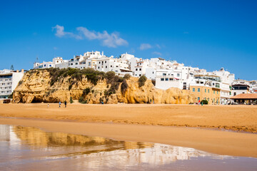 Wall Mural - Great view of Fisherman Beach, Praia dos Pescadores, with whitewashed houses on cliff, Albufeira, Algarve, Portugal