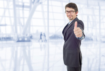 businessman thumb up at the office