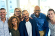 © Tamani Chithambo/peopleimages.com - Business people, portrait and hug in a office with a smile from friends with teamwork and collaboration. Diversity, happiness and writer staff together and feeling proud from motivation and success