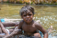 Aboriginal Boy In A River