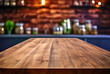 © oksa_studio - Empty wooden table and blurred background of kitchen. For product display