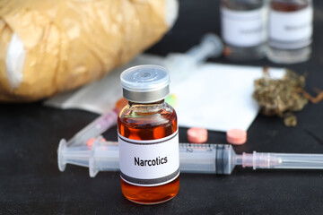 Sticker - narcotics in a vial,  narcotics are dangerous to health