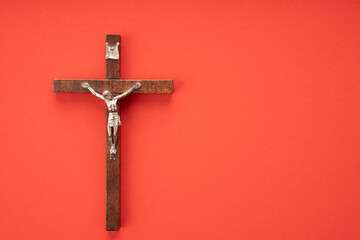 Christian Pentecost. Whit Sunday. A cross with a birch branch on a white, green, red and black background.